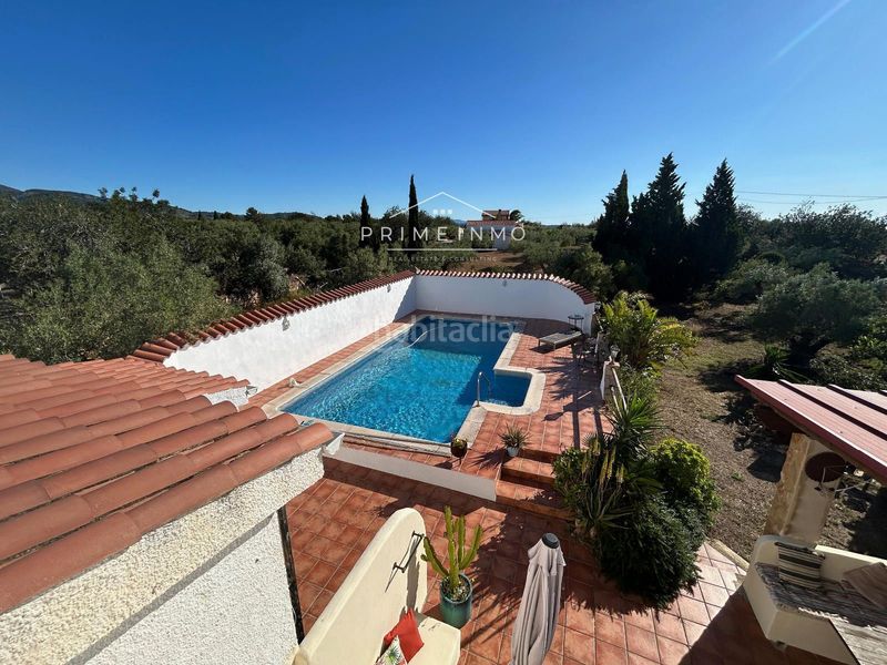 Foto 93a65387-ca08-4f56-b983-d61a4c08e420. Masia amb piscina a Ampolla (L´)