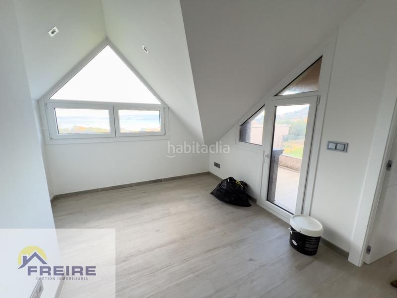 Foto 022aa0a5-ce3b-44be-802f-a39ffc26bd71. Casa con riscaldamento in Marín