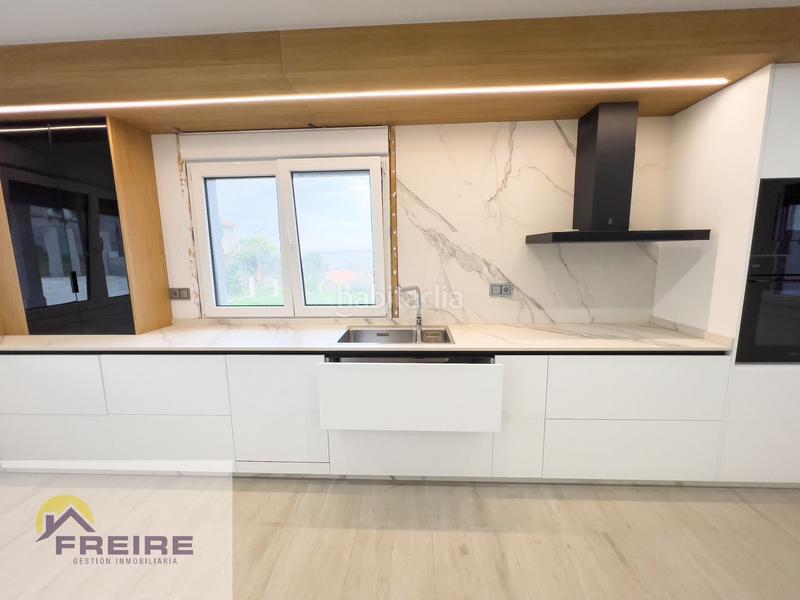 Foto f89da56c-b896-42e6-831b-24ce085c7fcb. Casa con riscaldamento in Marín