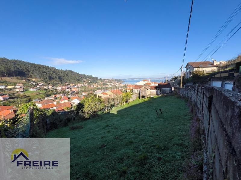 Foto c35cf740-1125-4310-878d-405074199129. Terreny residencial a Bueu
