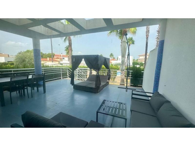 Foto 6bf54529-95fb-4e03-a7fd-c2fe0030e077. Rent flat with parking pool in Oliva nova Oliva