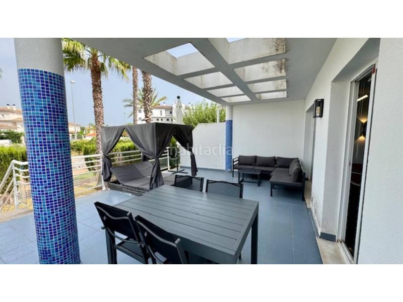 Foto f6db455c-a7e7-429a-9a08-df6b3f906c72. Rent flat with parking pool in Oliva nova Oliva