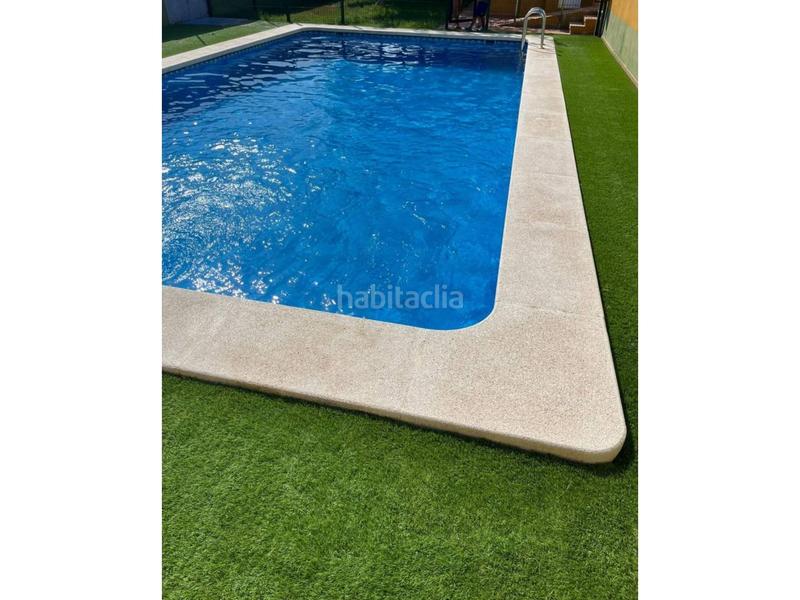 Foto 1fcd62f4-0fd0-44e0-a785-eb4c72c54ce0. Reihenhaus mit parking pool in Playa-Ben Afeli Almazora / Almassora