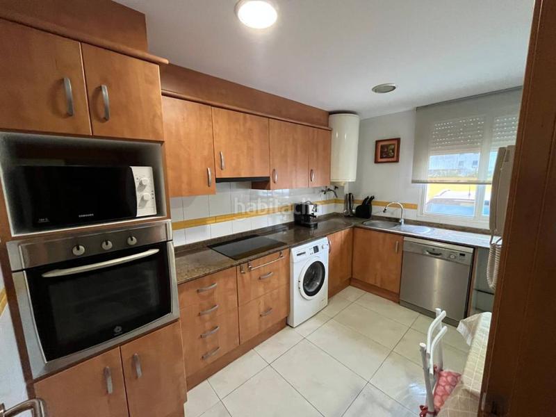 Foto 47900fb8-b34b-4311-8f52-b4118fd20c9e. Reihenhaus mit parking pool in Playa-Ben Afeli Almazora / Almassora