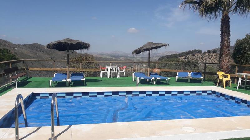 Foto f95fbcea-9062-4b5b-9708-c66b6eb9f308. Maison avec parking piscine dans Ardales