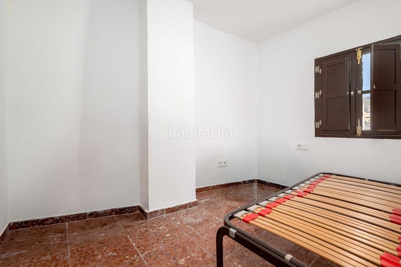 Foto 526b5a00-2e1d-474b-8def-ff9ef8a99d79. Casa adossada a Loja