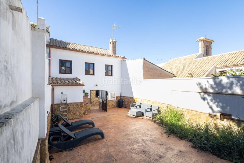 Foto 798ab106-402c-4ff8-936f-bffae5bbc7bc. Casa adossada a Loja