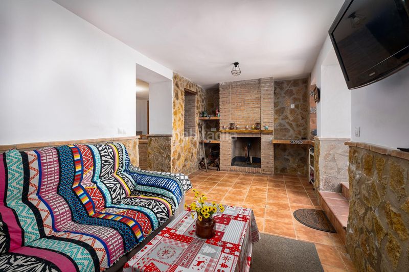 Foto a85540fe-08f8-4069-a87d-7986d25ed403. Casa adossada a Loja