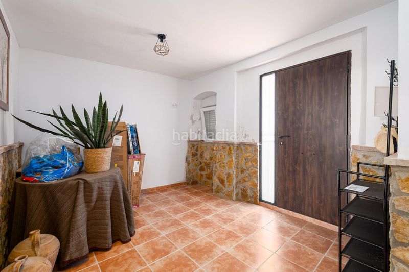 Foto aca8308e-69ad-4303-b765-8ccdb84ed06a. Casa adossada a Loja