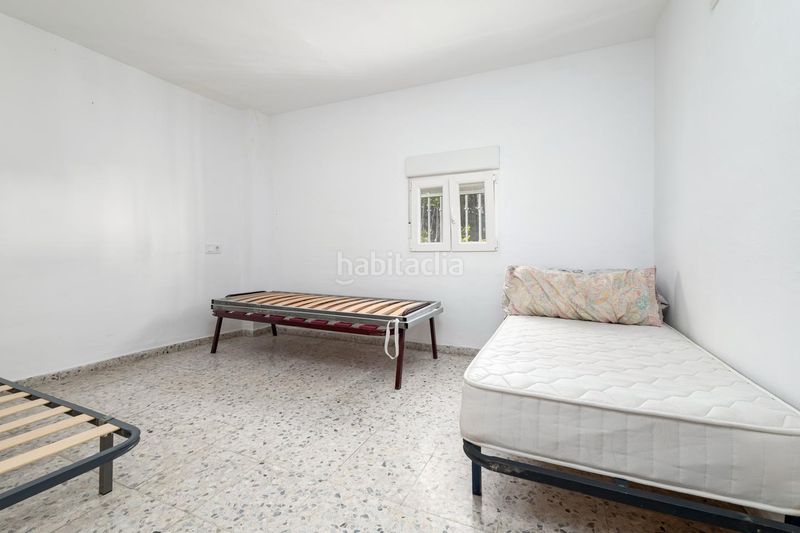 Foto ad0c5507-cd19-4143-92d0-078c65a88a3f. Casa adossada a Loja