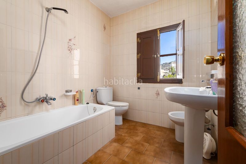 Foto b0f74bf0-2f41-40ca-9f89-cddac2738309. Casa adossada a Loja