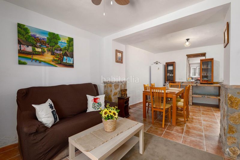 Foto c09a6560-510c-4ddc-84e5-3dae2d0c5d2d. Casa adossada a Loja