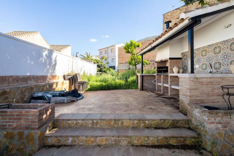 Foto d9eea223-df91-43e8-aee3-d00c9ae3fcfe. Casa adossada a Loja