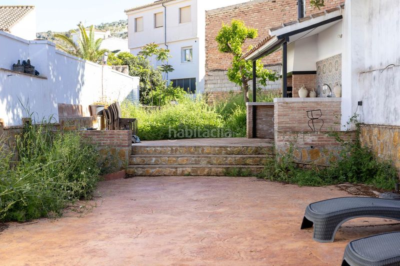 Foto e7f5228e-0c4d-49f5-b424-d775903c2419. Casa adossada a Loja