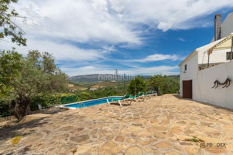 Foto 8b58a383-ea6b-4ae7-9374-704198559f78. Casa amb aparcament piscina a Almogía
