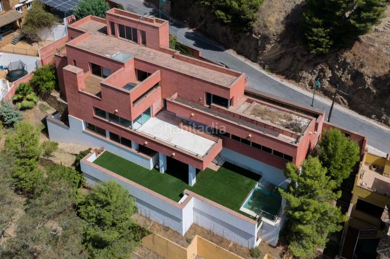 Foto 84d2a262-45b8-4bda-8d0a-f6b6c4949f33. Casa amb aparcament piscina a El Atabal Málaga