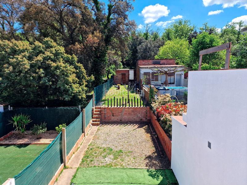 Foto ccb700e5-8391-4c5f-8c2c-1e60cd566cf9. Casa adossada a Palau Girona