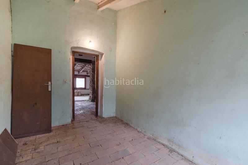 Foto a29034f5-b31c-4449-8094-6f651a7d222b. Masía exclusiva apialia. a tenim una casa de poble, de pedra, per fer una reforma integral. en Sant Joan de Mollet