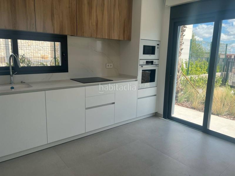 Foto a18dfe9f-26bf-4aa5-8b0b-fbf23f696366. Semi detached house with parking pool in El Pinar de Campoverde Pilar de la Horadada