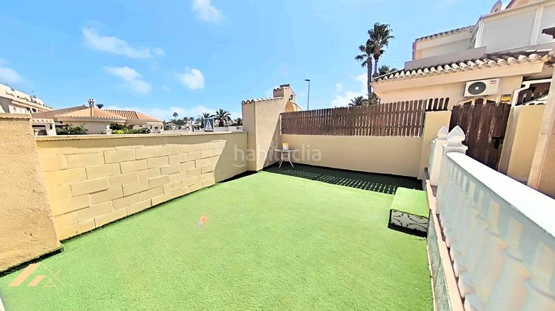 Foto 0485035c-9521-4401-83f2-0cef2ad44a96. Casa adosada chalet adosado en Playa Flamenca costa en Orihuela