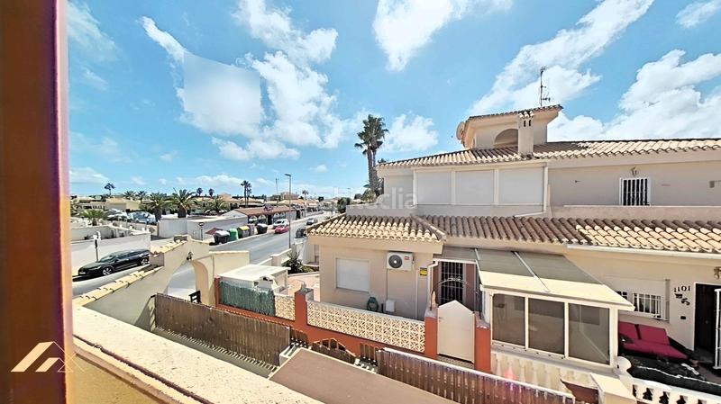 Foto 2c2b9c8b-e972-4d6c-9bf8-dd96e43fc616. Casa adosada chalet adosado en Playa Flamenca costa en Orihuela
