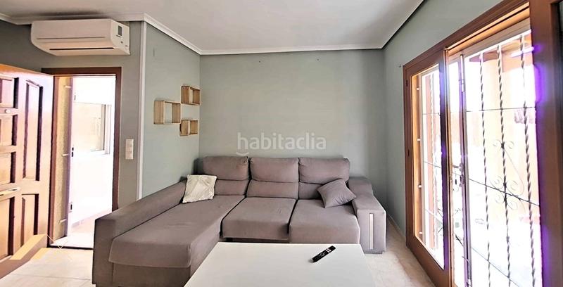 Foto ae5081aa-ad7b-4c3b-a84e-72a4ff489c69. Reihenhaus mit heizung parking pool in Playa Flamenca Orihuela