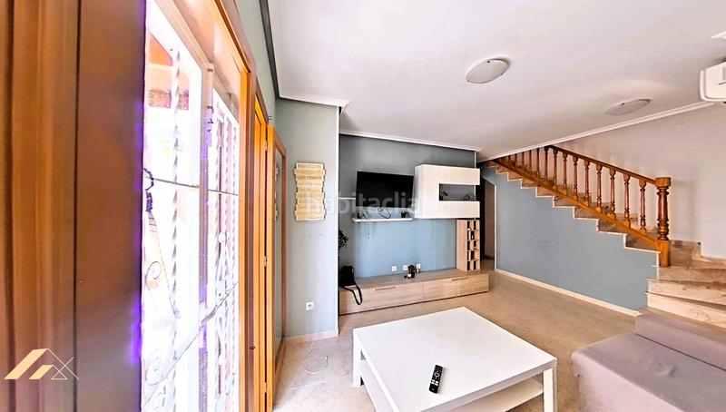 Foto c5866b70-8588-458d-810b-ff5af6fe5e01. Casa adosada chalet adosado en Playa Flamenca costa en Orihuela