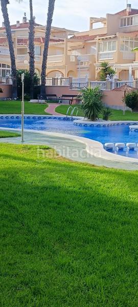 Foto 0a93d15e-fcfb-4e04-9803-d3cffda5cc1e. Casa adossada amb calefacció piscina a Zeniamar - Horizonte - La Campana Orihuela