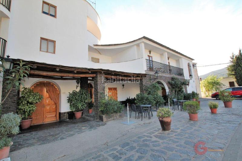 Foto 949c4d6b-1fa9-49e4-a406-c30207e0350f. Edifici a Pórtugos