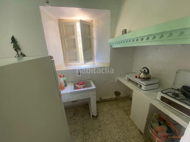 Foto e5c4c93b-bc76-4bd5-81c0-33cd601123c0. Masia a Comares