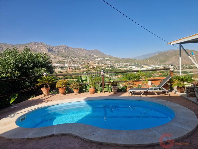 Foto d7af96d7-b222-4651-8512-8dd177802ff4. Casa amb piscina a Molvízar