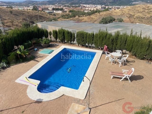 Foto 428ff9e8-bb53-494f-b129-842c7604cd92. Country house with parking pool in Camino Algarrobo - Las Arenas Vélez - Málaga