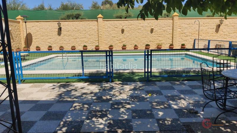 Foto dfffac5f-cfe8-4a86-9ff8-431f54195327. Chalet  en Montilla