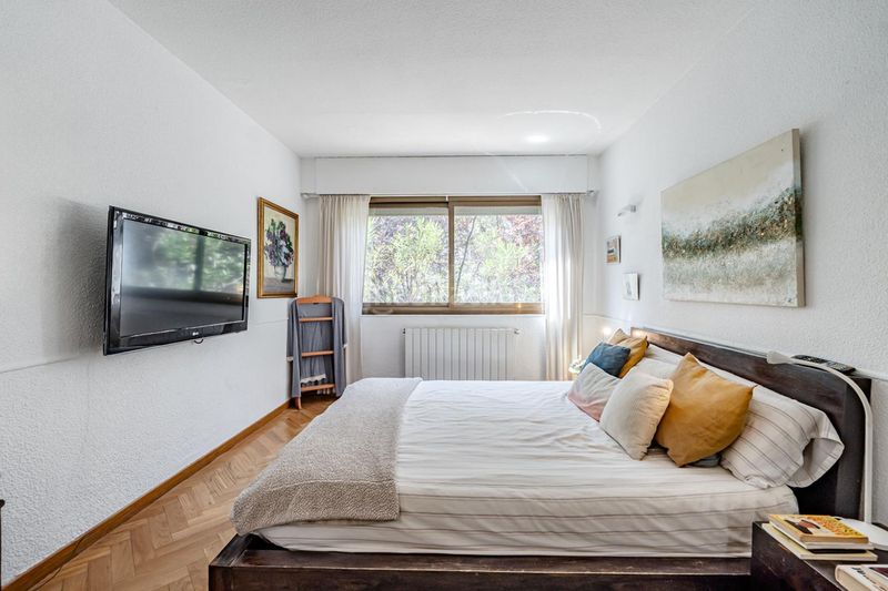 Foto 50c5400c-9367-44d2-a29d-f7fb03a54d5f. Casa aparellada amb calefacció piscina a Mirasierra Madrid