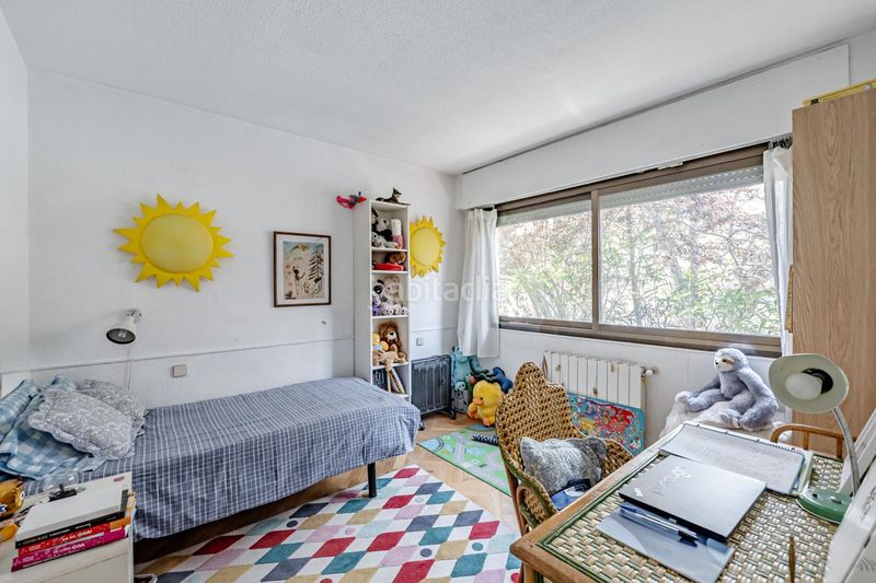 Foto ac4d2bed-96d0-4411-b368-fab7cfcee757. Casa aparellada amb calefacció piscina a Mirasierra Madrid