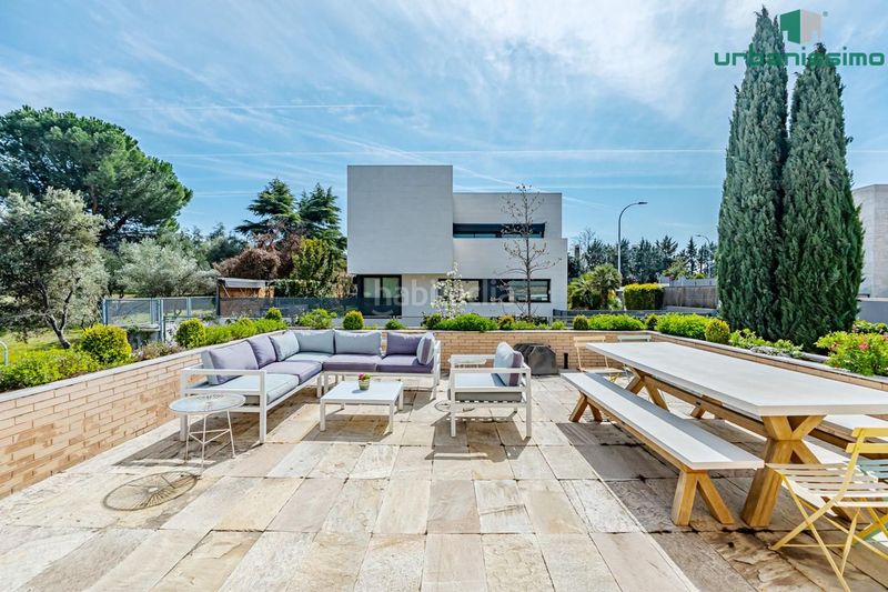 Foto 95a08859-d80e-4e2a-8309-666971bca0c4. Casa aparellada amb calefacció piscina a Valdemarín Madrid
