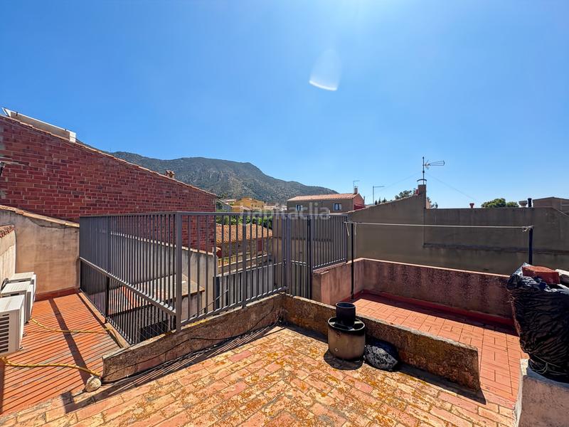 Foto 028dcbcd-f6e8-474e-8e88-76a2163f4de5. Casa adosada encantadora casa en medio del pueblo de palau saverdera, con vistas desde las terrazas a las montañas y con posibilidad de constru en Palau-saverdera