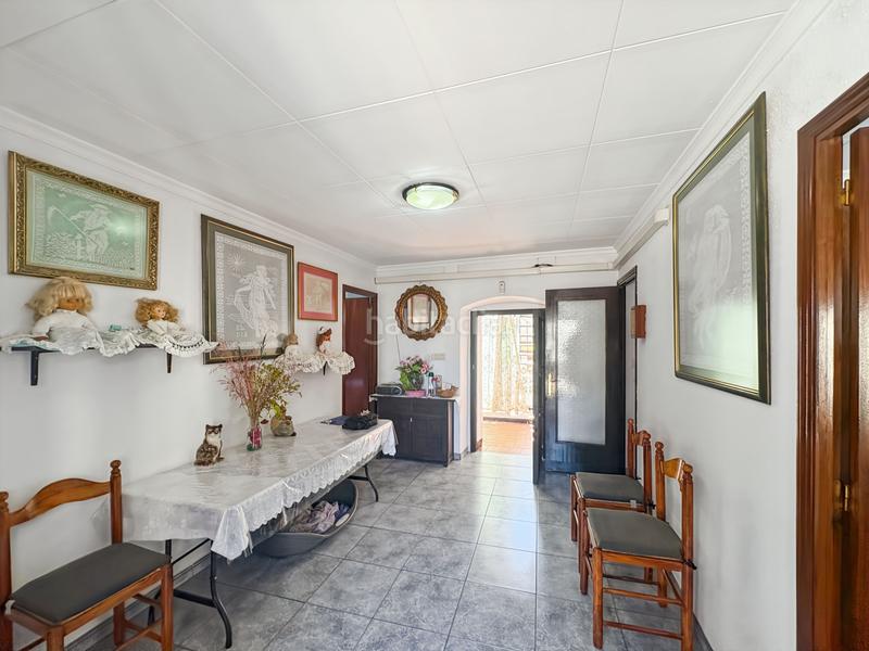 Foto a52af2b9-3105-4eba-895d-5c3f8a693cdd. Casa adosada encantadora casa en medio del pueblo de palau saverdera, con vistas desde las terrazas a las montañas y con posibilidad de constru en Palau-saverdera