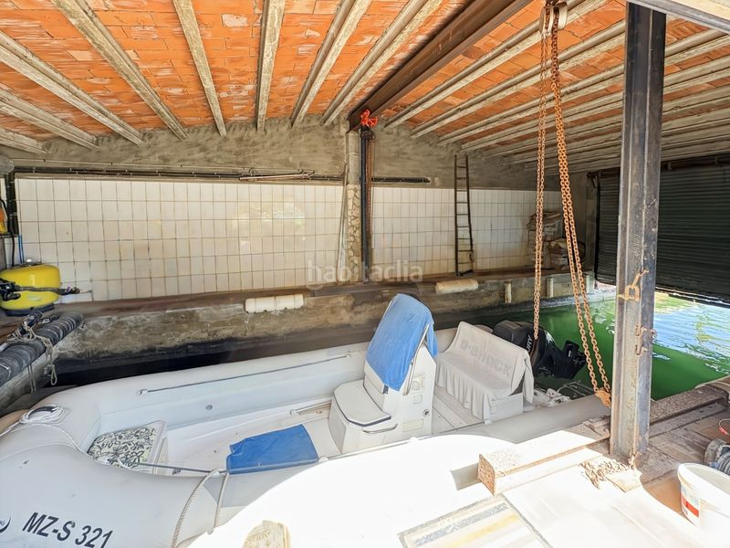 Foto 7a1903cb-d5ca-450f-8b53-6d0b0f16cf66. Casa amb calefacció aparcament piscina a Carmençó Empuriabrava