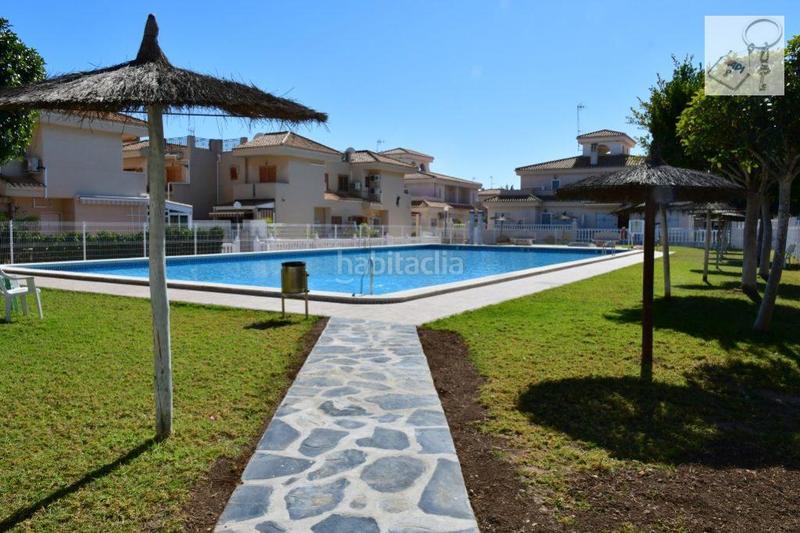 Foto c6684729-68a6-4d7e-a58d-4e32ee37785c. Haus mit pool in Playa Flamenca Orihuela