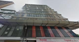 Terreny residencial a Navia. Edificio en obra parada en navia