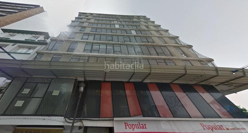 Foto 34c21c03-7e31-4088-bfb0-8102a01e2094. Terreno residencial edificio en obra parada en Navia