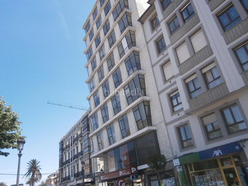 Foto 38431aff-888c-42ad-b961-184d7686ec69. Terreno residencial edificio en obra parada en Navia