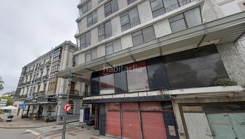 Foto bd4981f8-0a64-4c10-965b-d11fbfd86e64. Terreno residencial edificio en obra parada en Navia