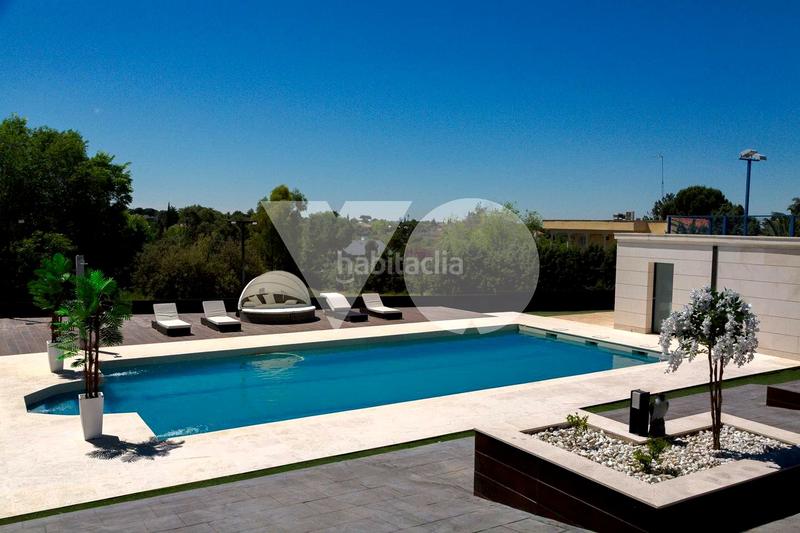 Foto 63196b94-7b9b-49d5-a839-7aeb617a568c. Location maison avec chauffage parking piscine dans Boadilla del Monte