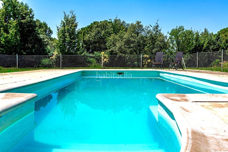 Foto 08756dd1-6bd0-4598-a0a5-ee5633044c03. Casa amb calefacció aparcament piscina a El Olivar de Mirabal Boadilla del Monte