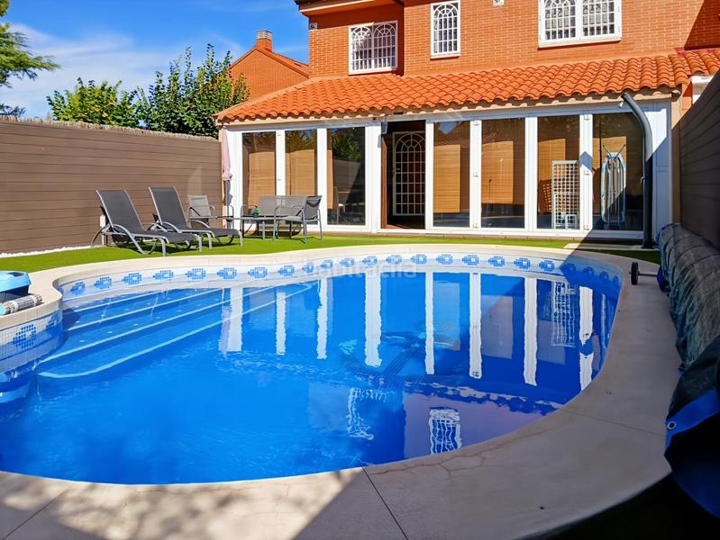 Foto 84cbbbe3-1e9e-4abe-b33f-222d2421e685. Casa adossada amb calefacció aparcament piscina a Rivas - Vaciamadrid