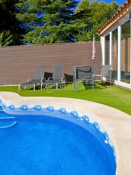 Foto a79815ad-9b23-41c1-9839-7319caa81877. Casa adossada amb calefacció aparcament piscina a Rivas - Vaciamadrid