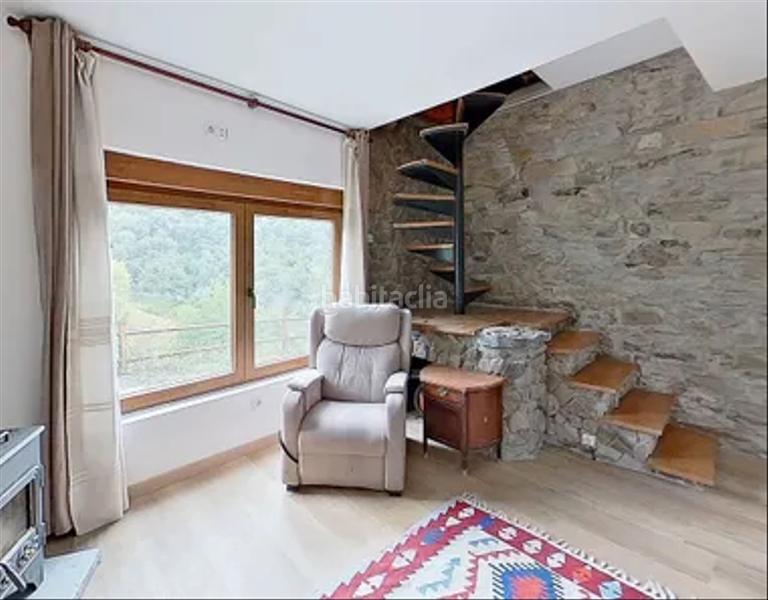 Foto 053e1173-904c-4913-a1fd-d2caf8c45513. Reihenhaus mit kamin in Laviana