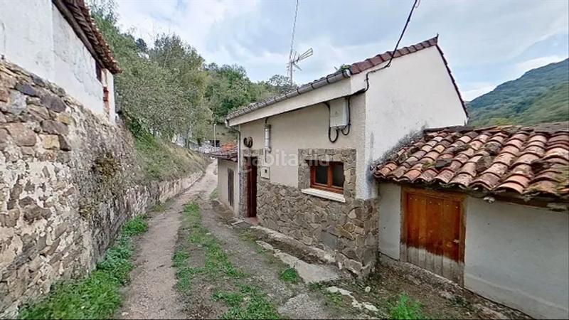 Foto 1bb40cbe-371e-4a2d-ac34-f07b635cf952. Reihenhaus mit kamin in Laviana